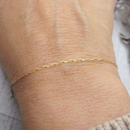 Mini Solid 14 Karat Gold Paperclip Chain Bracelet 7.25"